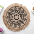 Beige round jute placemat with black geometric patterns and fringed edges for home decor - Type D Jute Tassel