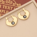 Detail of gold evil eye hoop earrings with black enamel on a beige jewelry tray - 4# (Gold Hoop Black Base White Dot Eye)