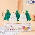 Five pieces of 4cm Christmas tree shaped candles in green and white with star toppers - Mixed Christmas Tree 5Pcs