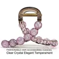 Detail of transparent brown hair claw clip with purple beads and pink rhinestones - Medium 8cm / Pink