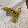 Detail of mustard yellow flocked bow hair clip with Smile Happy metal buckle decoration - Green - Single Bow (BB Clip)