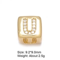 Macro shot of 8mm gold square alphabet bead U with micro zircon stones and size info - Letter U