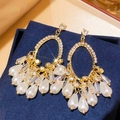 Macro detail of gold-plated bow pearl earrings with baroque crystals on velvet - 15# Vintage Baroque Pearl Crystal Tassel Studs