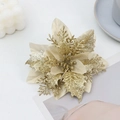 Detailed top view of gold glitter artificial poinsettia flower on white decorative surface - Small Three-leaf Gold