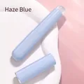 Pennello labbra portatile in silicone blu nebbia con finitura opaca e cappuccio trasparente - Blu Nebbia
