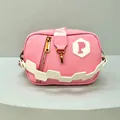 Pink PU leather shoulder bag with gold hardware and white sawtooth bottom design - Pink