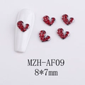 Macro shot of 8x7mm heart-shaped alloy nail charm with red rhinestones on white base - Red Rhinestone Heart (AF09)