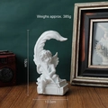 Retro white resin angel figurine holding a feather sitting on a book, 18cm height - Leaf Angel Figurine (Right)