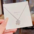 Silver four-leaf clover pendant necklace with sparkling zircons on a delicate chain - X641 Silver Clover Zirconia