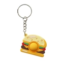 Hamburger Schlüsselanhänger mit Silikon-Lagen und gelbem Pop-it-Element zum Stressabbau - Hamburger