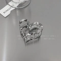 Silver liquid metal heart-shaped hair claw clip with sleek polished finish for women - Twisted Heart / Silver