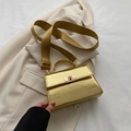 Compact gold crocodile pattern crossbody bag with metallic finish and wide textile strap - Gold