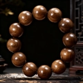 Goldseiden-Nanmu-Holz Armband mit 12 großen polierten runden dunklen Holzkugeln für Herren - Urholz Kreis Stil / 20mm*12 Perlen