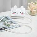 Mini white PU leather crossbody bag featuring cute bunny face and ears on a white table - White