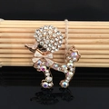 Sparkling poodle brooch with crystal rhinestones and white enamel bow tie decoration - Xd825384