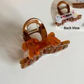 Pinza para pelo de caniche en acetato marrón con hueso I Love Dog y resorte metálico - 8cm / Perro Marrón