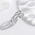 Detailed view of irregular intertwined silver copper ring with a polished reflective finish - Multi-layer Twisted Cross Silver Ring (EH870)