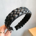 Close-up of the braided black PU leather texture on the wide-brimmed headband - Style 1 Wide / Black