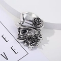 Macro shot of vintage skull and rose hat brooch in antique silver finish on a white stand - 14# Rose Hat Skull - Antique Silver