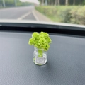 Green faux plant in glass jar car dashboard ornament with Good Luck label - Green Gypsophila