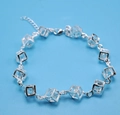 Bracelet argenté avec cubes évidés sertis de cristaux clairs et fermoir mousqueton - Bracelet Zirconium Blanc / Blanc