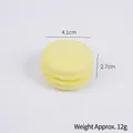 Gelbes PU-Macaron-Quetschspielzeug mit Textur, 4,1 cm Durchmesser und 12 g Gewicht - Hellgelb