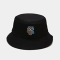 Detailed close-up of colorful owl embroidery on a black cotton canvas bucket hat - Blue Owl Black