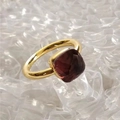 Macro shot of gold square-cut red zircon stone set on a luxury stainless steel ring - Circumference 54MM-US7 / Gold Base: Feb-Purple