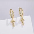 Close-up of golden T-letter earrings with sparkling pavé white zircon stones - Letter T (Style: 0229)
