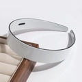 Detail of white wide headband with black trim on a wooden jewelry display tray - Wide Version / White