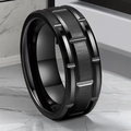 Close-up of black brushed stainless steel ring with geometric stepped cut on marble - US 5 / Black