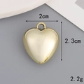 Detailed view showing a 2cm x 2.3cm golden heart pendant with dimension and weight labels - 20mm*23mm Heart / Gold