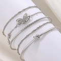 Silver alloy 5-piece bracelet set featuring butterfly charm and sparkling rhinestones - Silver (7174)