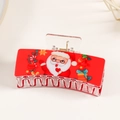 Christmas hair claw clip featuring a red Santa Claus design with gift and star elements - Santa & Gifts (C10-4-11)