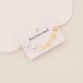 Detail of three pairs of stainless steel earrings featuring butterfly and petal designs - 5# Butterfly Petal Zirconia Style (3 Pairs Set)