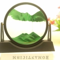 Green moving sand art decor with black circular frame and base for desktop display - 12 Inch Stand Green
