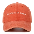 Detailed embroidery of My Dog Is My Shrink text on washed cotton baseball cap - Orange