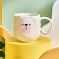 Cute white cartoon puppy ceramic mug with ears and handle on yellow display stand - White Dog Cup