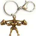Porte-clés fitness en bronze antique représentant un culturiste soulevant une haltère - Culturiste Haltère-Bronze Antique (KC035g)