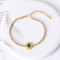 Elegant gold titanium steel bracelet with oval green gemstone and white zircon stones - Green Zircon Sunflower