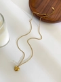 Collana in acciaio inossidabile dorato con ciondolo a cuore e incisione stellata - Cuore
