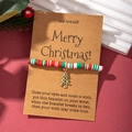 Detailed view of polymer clay Christmas wish bracelet with festive gold tree charm - Christmas Tree A