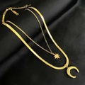 Detail shot of 18K gold plated double layer necklace with star and moon pendants - Star Moon Layered Necklace / Gold