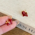 Red enamel unicorn stud earrings with gold plating on a warm aesthetic background - Flying Horse Style (Silver Needle-Gold-Red)