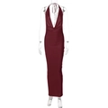 Detail of deep red halter maxi dress featuring a sexy deep V-neck and open back design - XS / Burgundy