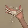 Collana di perle a doppio strato con fiore in maglia e nappe in argento eleganti - Collana-Bianco