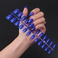 Detailed view of long square royal blue press-on nails with high-gloss UV finish coating - Royal Blue (CFL-04)