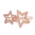 Elegante fermaglio per capelli a stella oro rosa con strass lucidi su sfondo bianco - Oro rosa