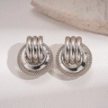 Close-up of geometric multi-layer hollow mesh ring earrings with polished silver finish - Silver (Silver Pin) / Silver