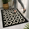 Zerbino nero con motivi geometrici a rombi bianchi per ingresso e corridoio - 50x80cm / Design Parker